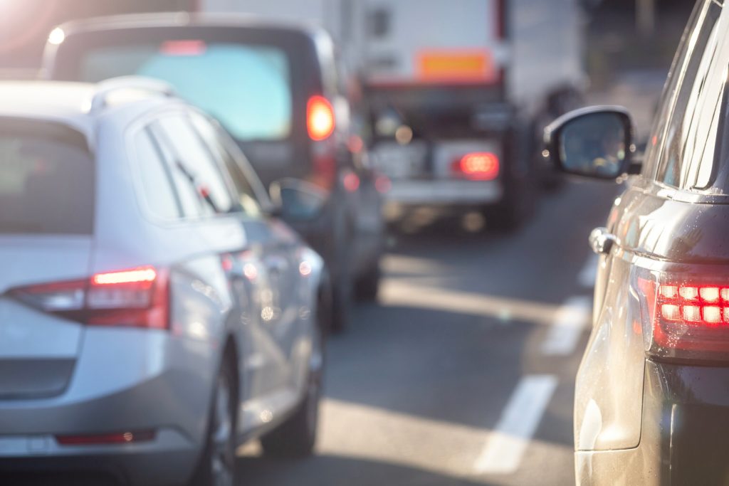 Traffic jam congestion with rows of cars on highway or motorway in rush hour after accident