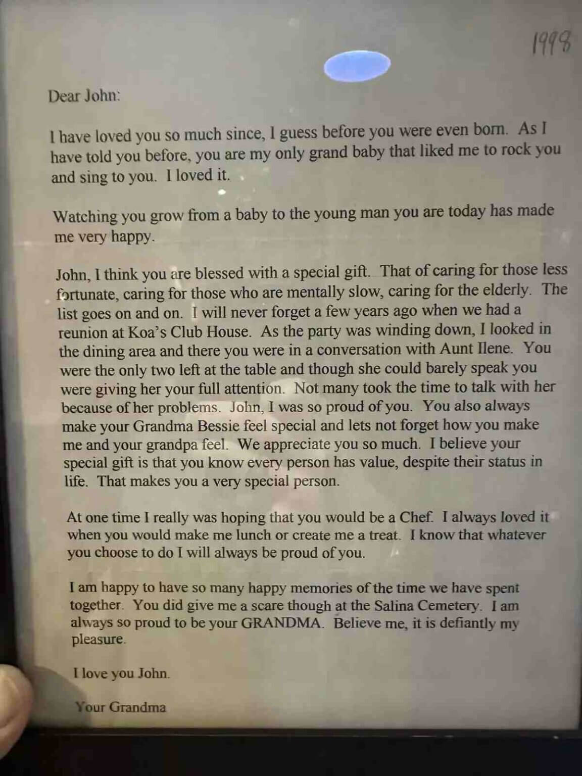 A typed letter signed by a grandmother to her grandson, John, expressing her pride in his character as a 2024 Renee Torgenson Scholar and her love for him.