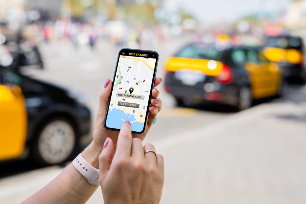 woman selecting her location on a rideshare app